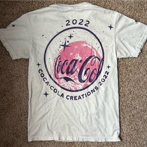 Coca Cola x Pacsun Tan 2022 Pink & Purple Graphic T Shirt Size S |A132